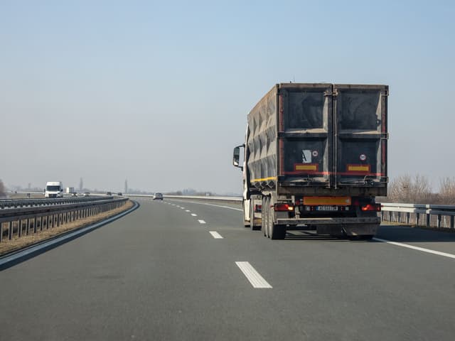 Truck transporting freight on an open road
